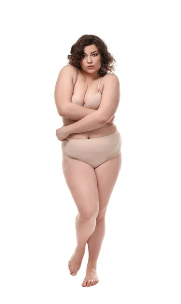 Timido plus size donna su sfondo bianco. Concetto di corpo positivo — Foto Stock