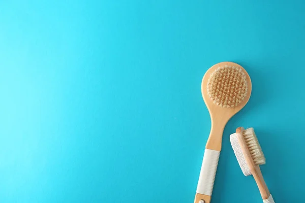 Massage brushes on color background — Stock Photo, Image