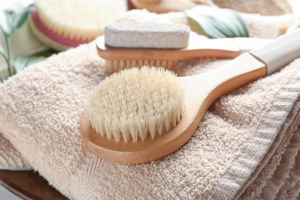 Massage brushes on towel, closeup — Stock Photo, Image