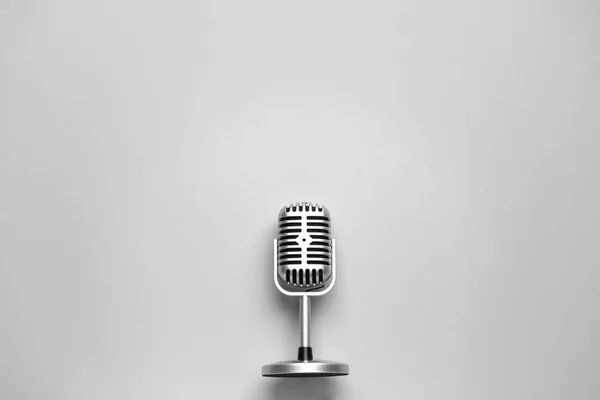 Retro microphone on light background — Stock Photo, Image