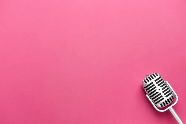 Retro microphone on color background — Stock Photo, Image