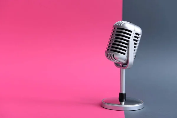 Retro microphone on color background — Stock Photo, Image