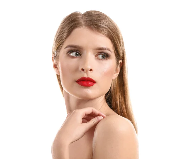 Vacker ung kvinna med ljus makeup på vit bakgrund — Stockfoto
