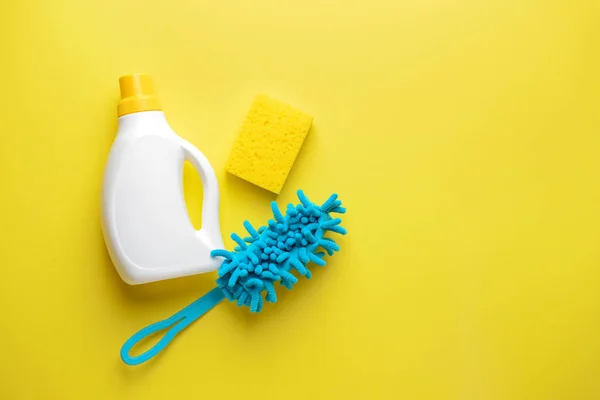 Set of cleaning supplies on color background — Stock Photo, Image