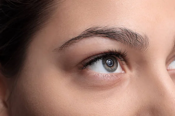 Beautiful young woman with eyelash extensions, closeup — Stock Photo, Image