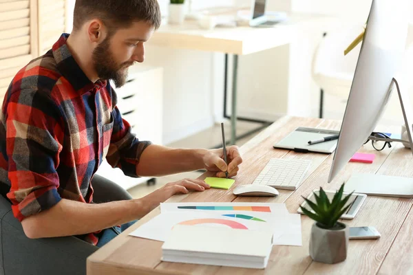 Male designer working in office — Stock Photo, Image