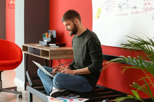 Male interior designer working in office — Stock Photo, Image