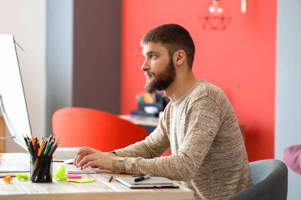 Male designer working in office — Stock Photo, Image