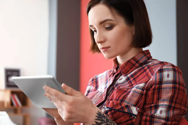 Female designer working in office — Stock Photo, Image