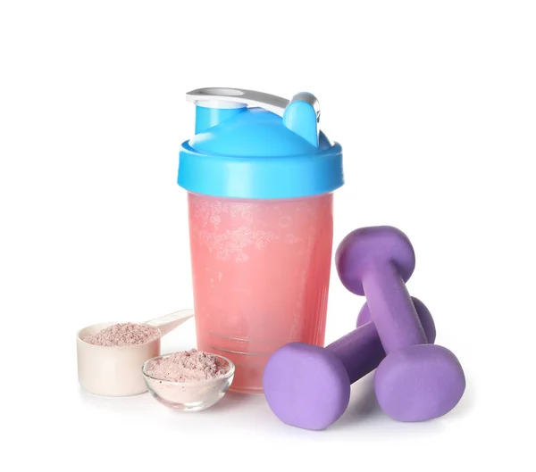 Bottle of protein shake with dumbbells on white background — Stock Photo, Image