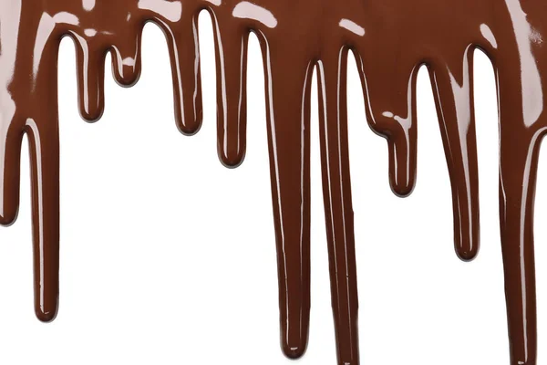 Flecken von geschmolzener Schokolade auf weißem Hintergrund — Stockfoto