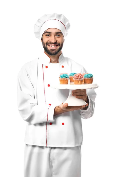 Mężczyzna cukiernik z smaczny deser na białym tle — Zdjęcie stockowe