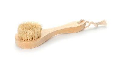 beyaz zemin üzerine masaj fırçası