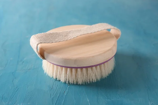 Massage brush on color background — Stock Photo, Image