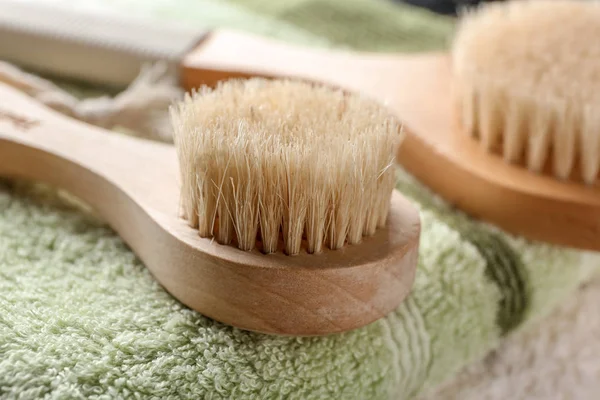 Massage brushes on towel, closeup — Stock Photo, Image