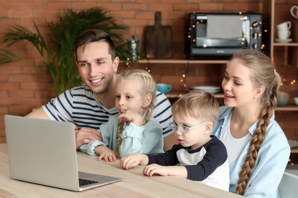 Happy family watching cartoons at home — Stock Photo, Image