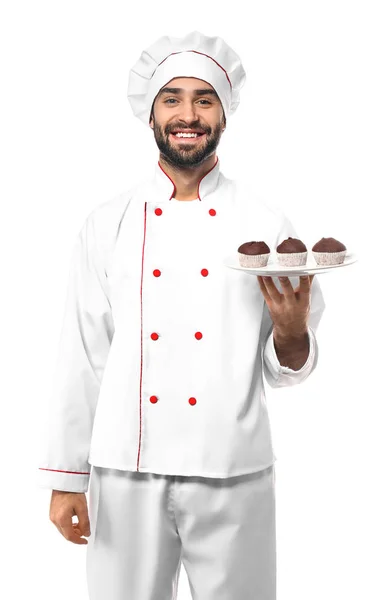 Mužské cukrář s chutný dezert na bílém pozadí — Stock fotografie
