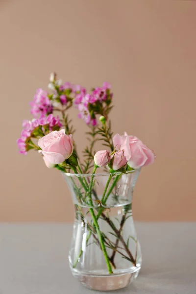 Vase with beautiful flowers on table — Stock Photo, Image