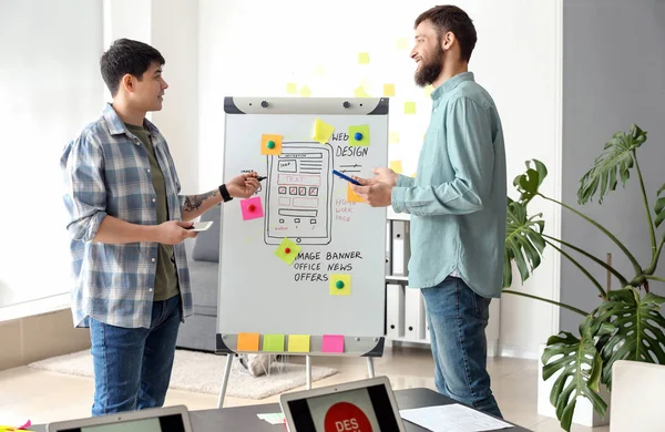 Young IT designers working in office — Stock Photo, Image