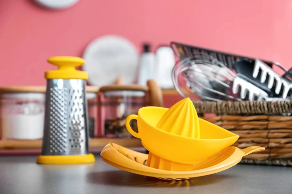 Set of utensils on table in kitchen — Stock Photo, Image