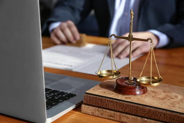 Scales of justice on table of notary public — Stock Photo, Image