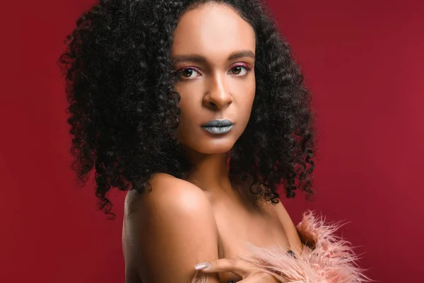Portrait of beautiful African-American woman with unusual makeup on color background — Stock Photo, Image
