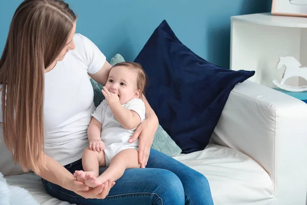 Happy mother with adorable baby boy at home — Stock Photo, Image