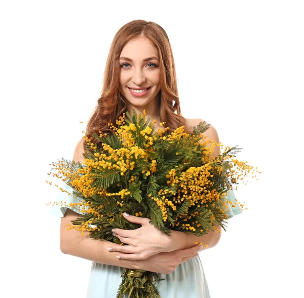 Beautiful young woman with bouquet of mimosa flowers on white background — Stock Photo, Image