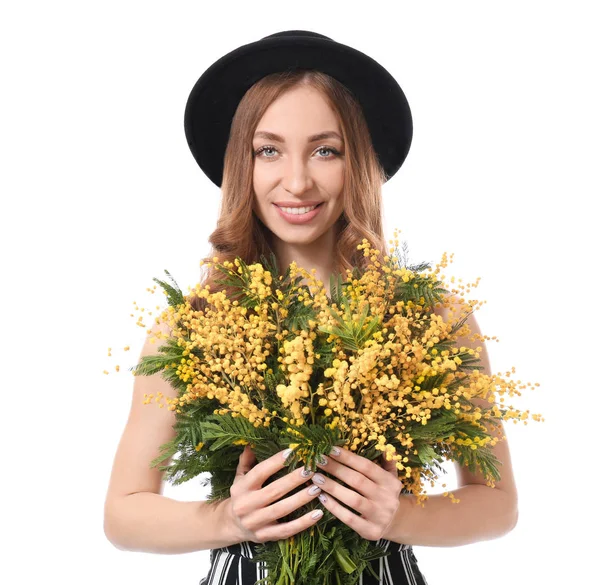Beautiful young woman with bouquet of mimosa flowers on white background — Stock Photo, Image