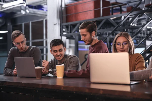 Young colleagues during coffee break in cafe — Stock Photo, Image