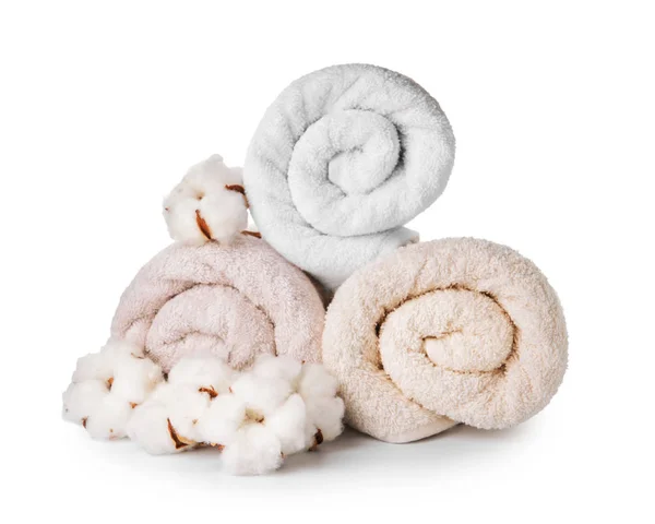Cotton flowers with soft towels on white background — Stock Photo, Image