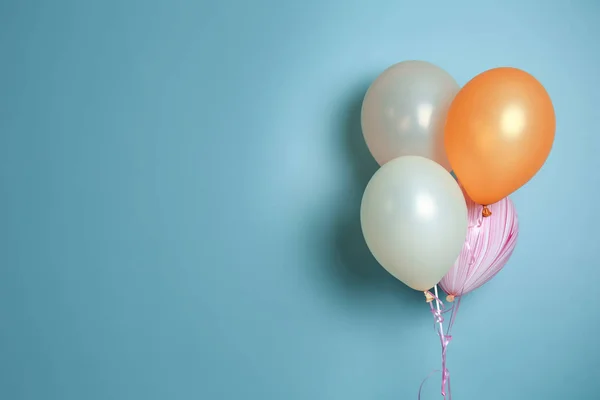 Air balloons on color background — Stock Photo, Image