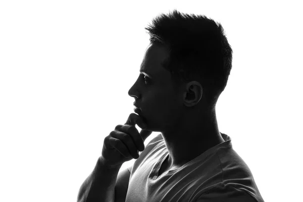 Silhouette of thoughtful young man on white background — Stock Photo, Image