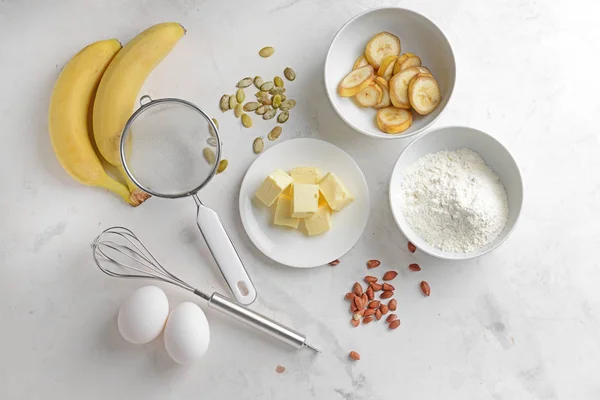 Ingredients for banana bread on light table — Stock Photo, Image