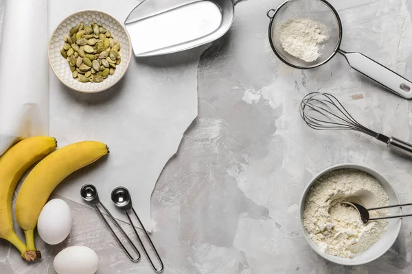 Ingredients for banana bread on grunge background — Stock Photo, Image