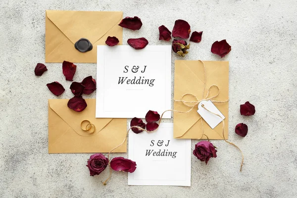 Wedding invitations on grey background — Stock Photo, Image