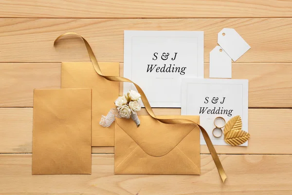 Wedding invitations on wooden background — Stock Photo, Image