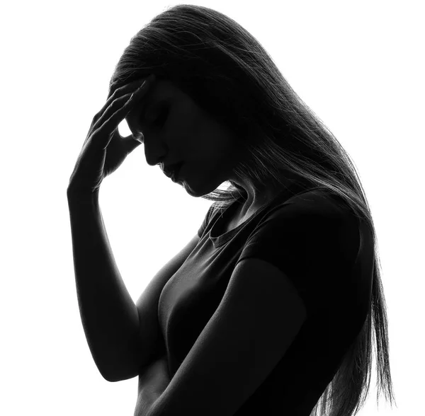 Silhouette of thoughtful young woman on white background — Stock Photo, Image