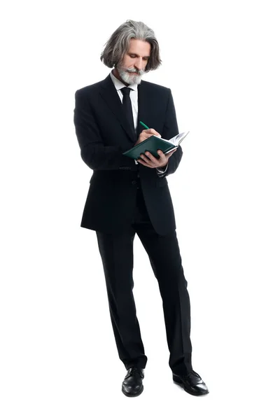 Guapo hombre de negocios maduro con cuaderno sobre fondo blanco — Foto de Stock