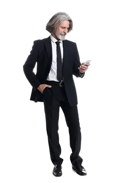 Handsome mature businessman with phone on white background — Stock Photo, Image