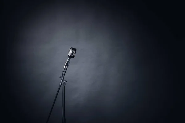 Retro microphone on dark background — Stock Photo, Image