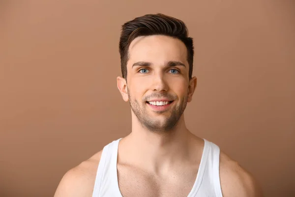 Portrait of handsome man on color background — Stock Photo, Image