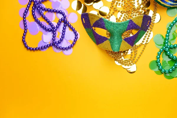 Festive mask with decor on color background — Stock Photo, Image