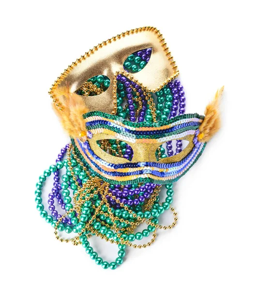 Festive masks with beads on white background — Stock Photo, Image