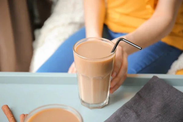 Woman drinking tasty frappe coffee at home — Stock Photo, Image