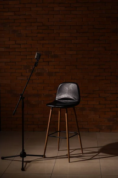 Microphone with chair in studio