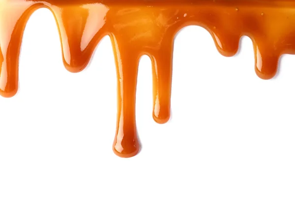 Stains of liquid caramel on white background — Stock Photo, Image