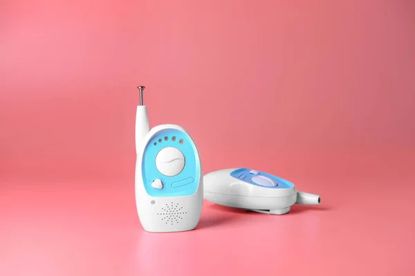 Modern baby monitors on color background — Stock Photo, Image