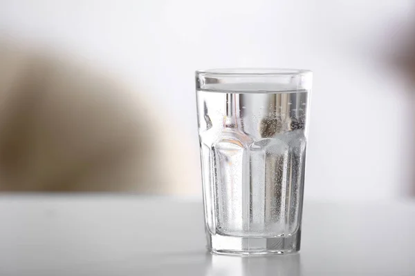 Glass of water on table — Stock Photo, Image