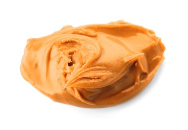 Beyaz arka planda lezzetli fıstık ezmesi.